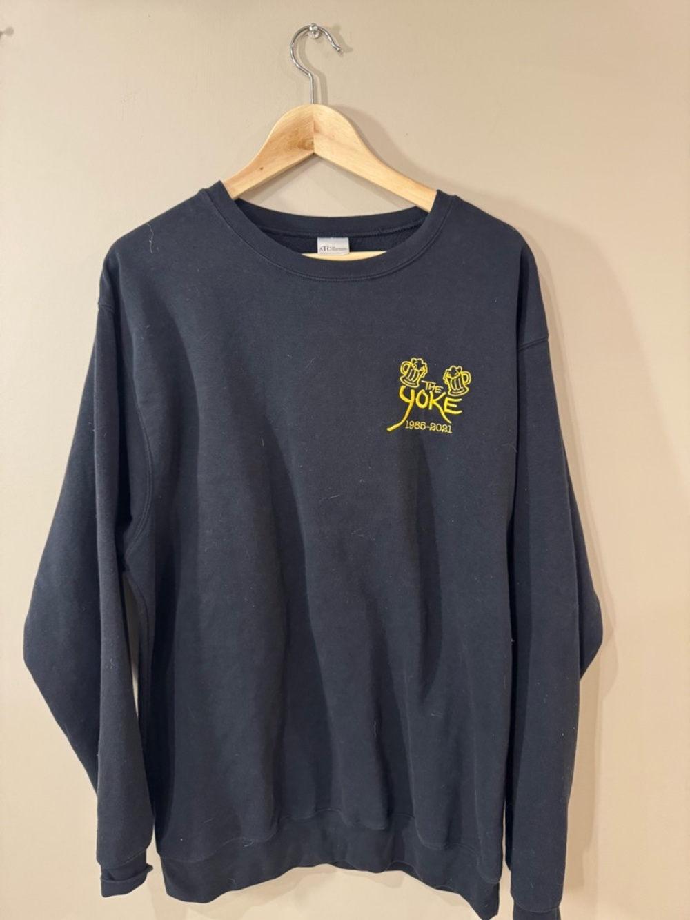 Black Crewneck Sweatshirt with Yellow Logo